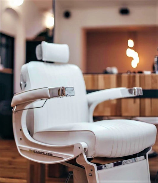 Takara Belmont 225 Elite White Elegance barber chair in a barbershop