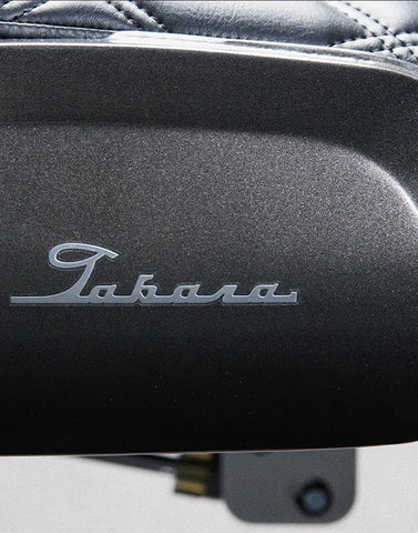 Takara logo and diamond-quilted seat detail on the Legacy 100 Vintage Diamond barber chair