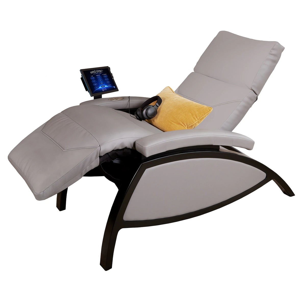 Living Earth Crafts Mind-Sync 2.0 lounger reclined with gray upholstery, headphones and screen