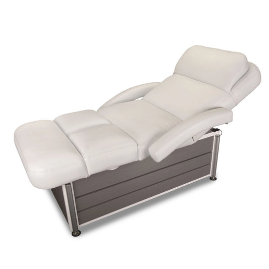 Living Earth Crafts Pan Pacific treatment table reclined with white upholstery and wood base