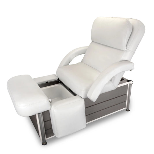 Living Earth Crafts Pan Pacific convertible treatment chair with white upholstery and open pedicure section