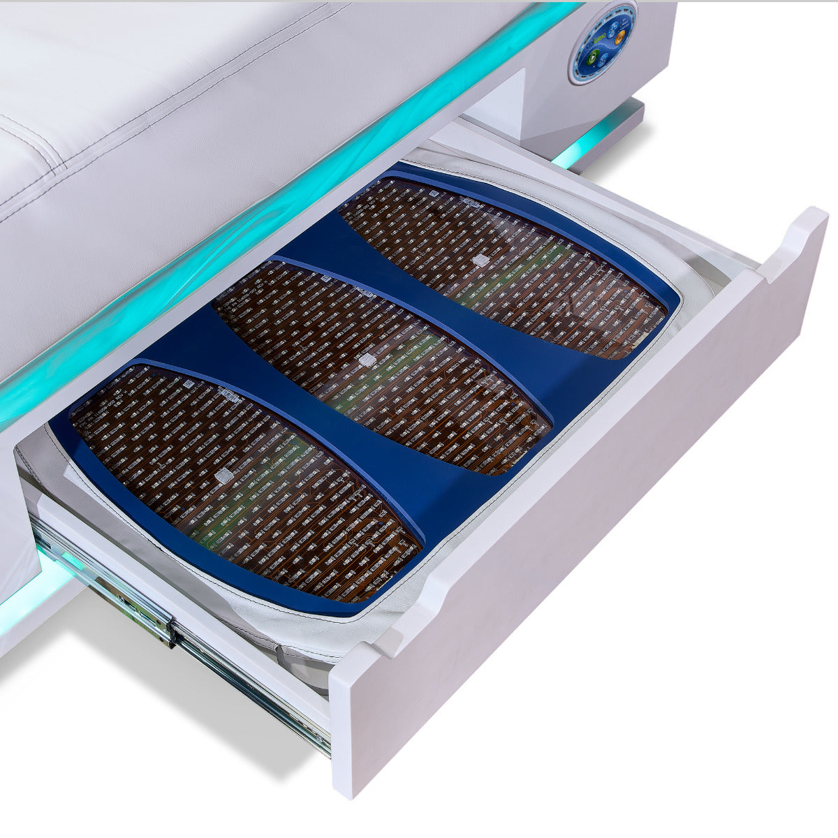 LED blanket stored in the open drawer of a Living Earth Crafts Radiance PT treatment table
