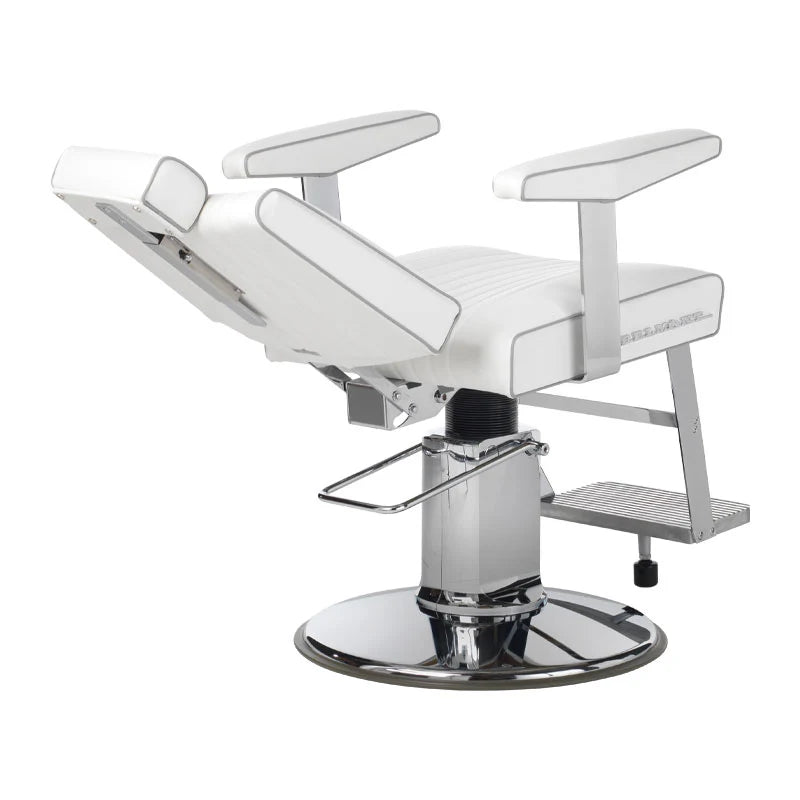 Recline view of Takara Belmont Dainty barber chair in white on a chrome slim85 base 
