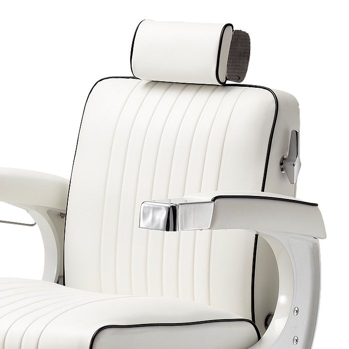 White vinyl backrest and adjustable headrest on the 225 Elite White Elegance barber chair