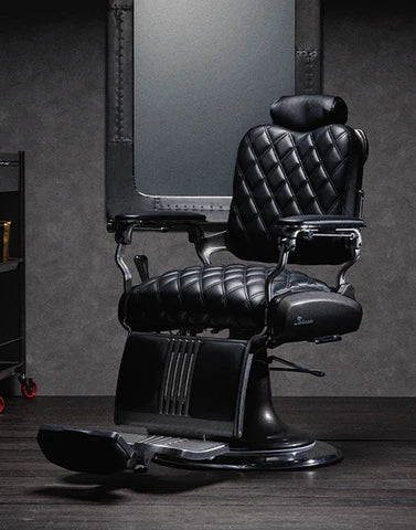 Front view of the Legacy 100 Vintage Diamond barber chair with black diamond-quilted upholstery