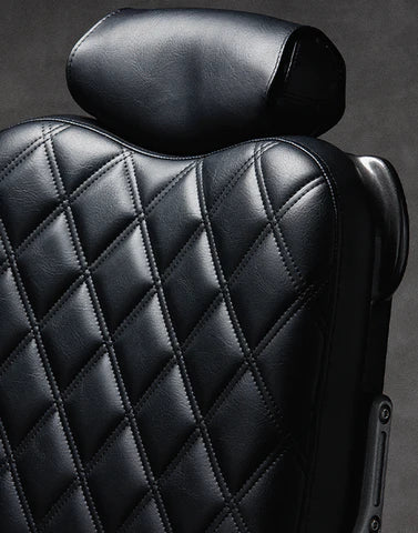 Black diamond-quilted backrest and headrest on the Legacy 100 Vintage Diamond barber chair
