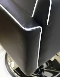 Takara Belmont Lusso styling chair upholstery with contrasting light piping