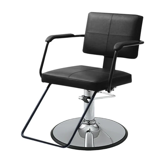 Black Takara Belmont Shiki styling chair with chrome round base and footrest