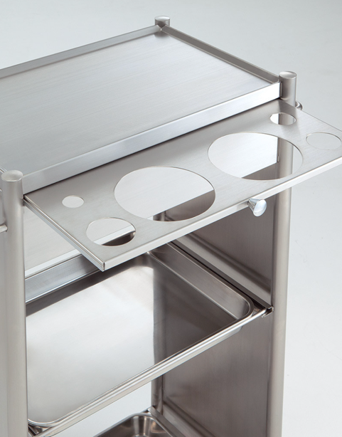 Tool holder with circular openings on a Takara Belmont D Galley salon wagon