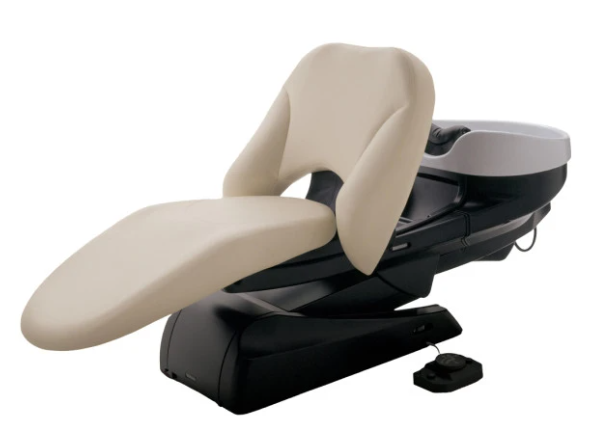 Takara Belmont YUME head spa shampoo unit with ivory upholstery and a white bowl
