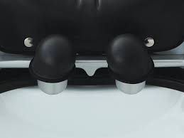 Two black Takara Belmont YUME head cushions fitted inside a shampoo bowl