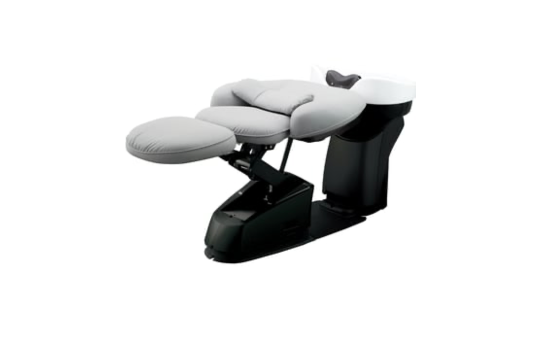 Takara Belmont YUME Suite shampoo unit reclined with its round leg support extended