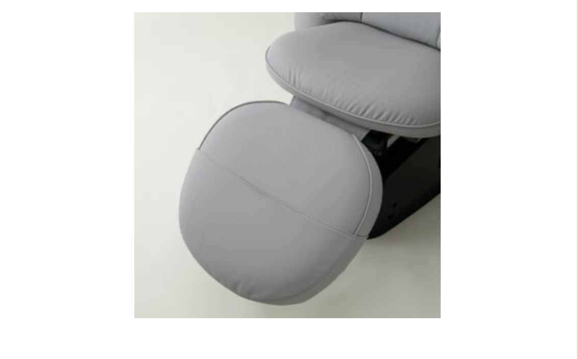 Close-up of the gray round leg support on a Takara Belmont YUME Suite chair